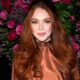 Lindsay Lohan en el desfile de otoño/invierno 2023 de Christian Siriano en Nueva York el 9 de febrero de 2023. Lohan espera su primer bebé, anunció en Instagram el 14 de marzo de 2023.(Charles Sykes / Charles Sykes/Invision/AP)