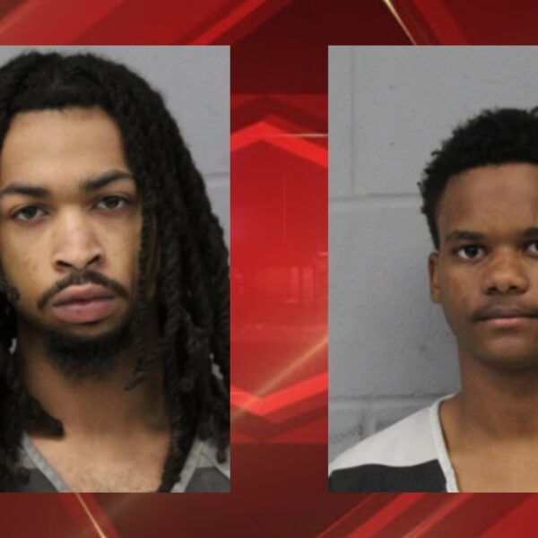 Two mugshots side by side: left man with long dreadlocks and beard, right man with short hair in striped shirt against gray wall