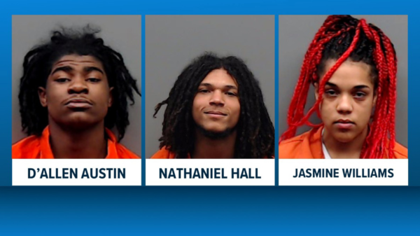 Mugshots of three individuals: D'Allen Austin (left), Nathaniel Hall (center), Jasmine Williams (right) in orange jumpsuits against gray backdrops.