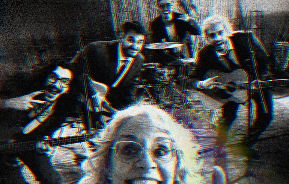 Older woman in front taking a selfie with a four‑piece band in a rehearsal space, features guitar, violin, and drums; image has a red/blue glitch effect.